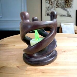 Parents and Child Kisii Soapstone Sculpture
Brown finish made in Kenya